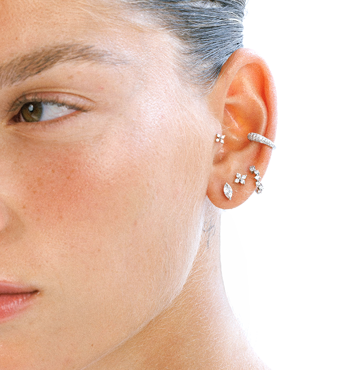 ALL SHINE HUGGIE hoop earring in white gold set with natural diamonds worn on a model image 3