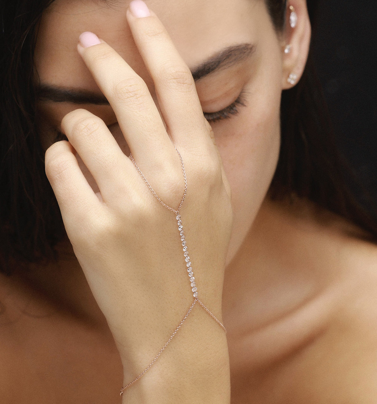 Elin floating diamond hand bracelet rose gold on model