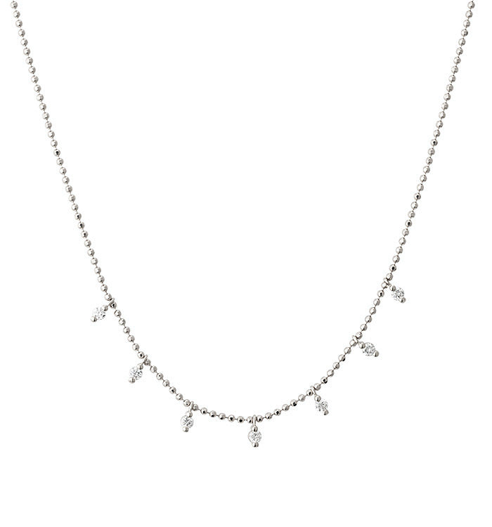 Flow necklace in white gold set with seven natural diamonds