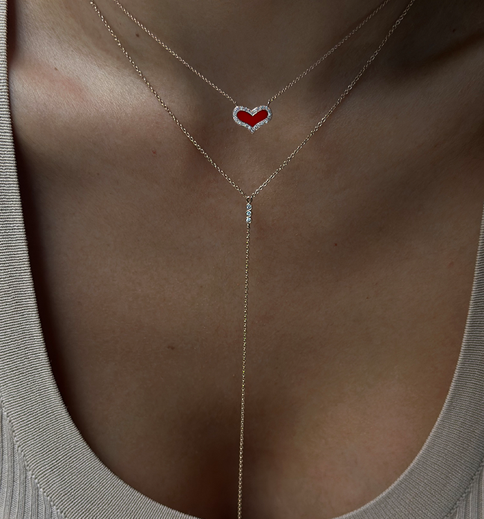 HEART DIAMONDS NECKLACE in rose gold set with natural diamonds and red enamel worn on a model
