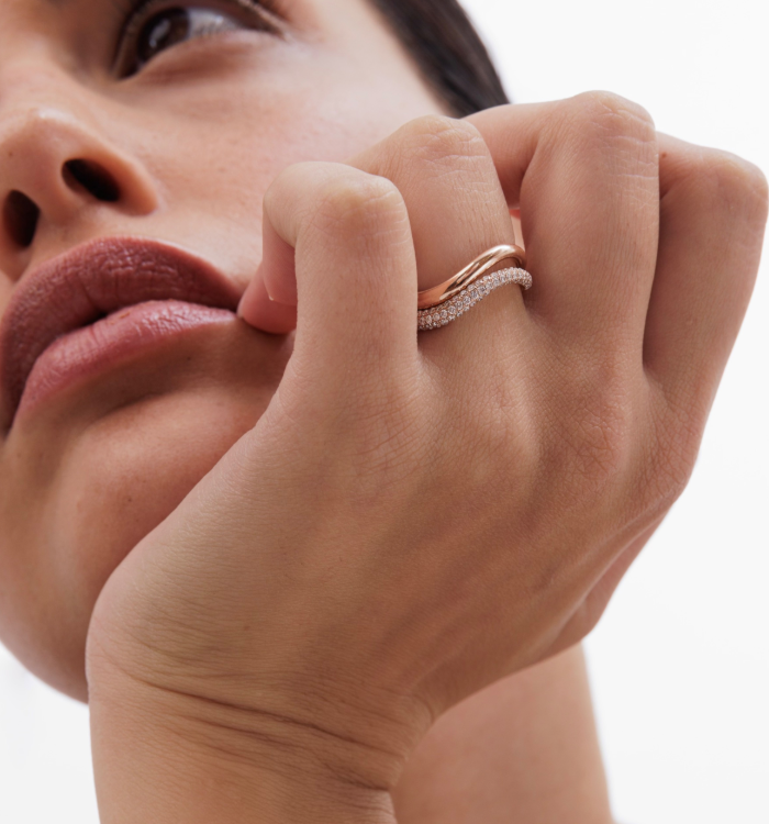 Maya ring in rose gold set with natural diamonds worn on a model hand second view